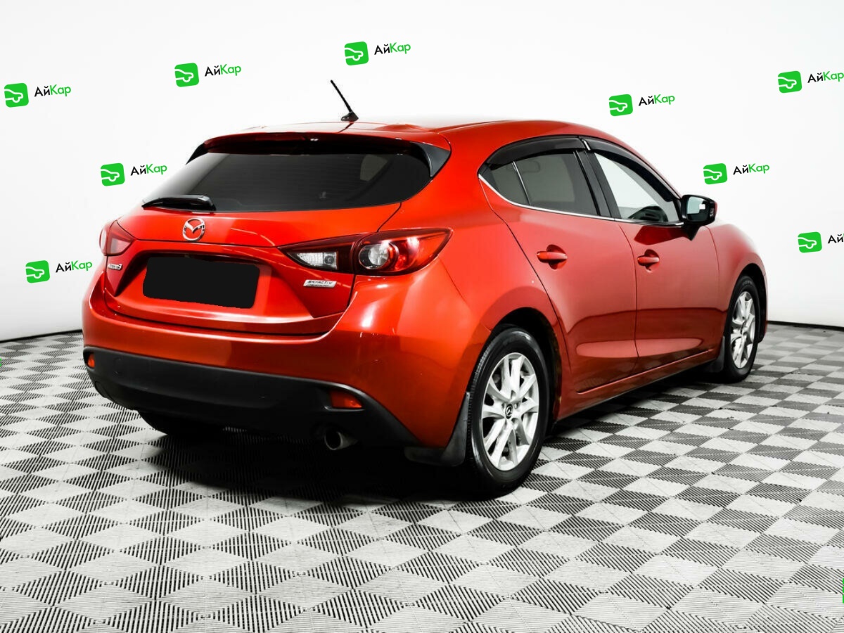 Mazda 3 с пробегом — 2014 год. Фото: #4