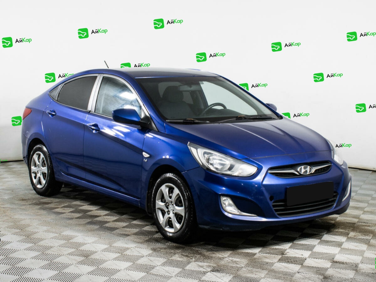 Hyundai Solaris с пробегом — 2012 год. Фото: #2