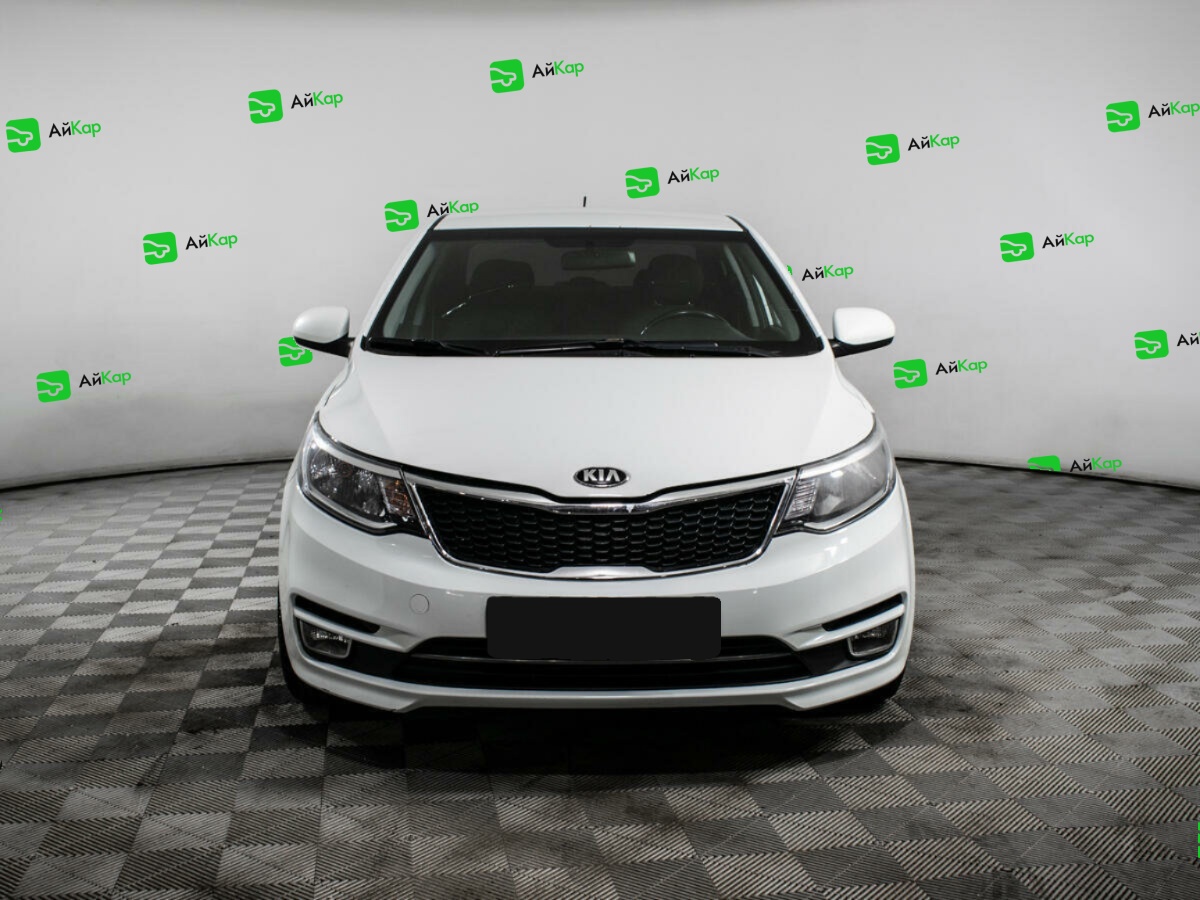 Kia Rio с пробегом — 2015 год. Фото: #1
