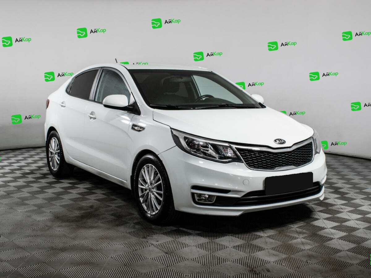 Kia Rio с пробегом — 2015 год. Фото: #2