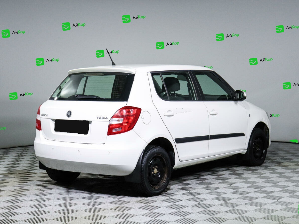 Skoda Fabia с пробегом — 2014 год. Фото: #4