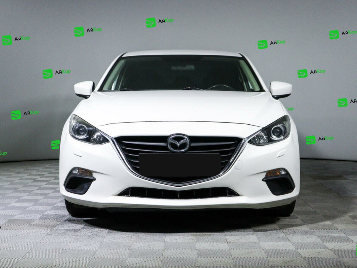 Mazda 3 с пробегом — 2014 год. Фото: #1