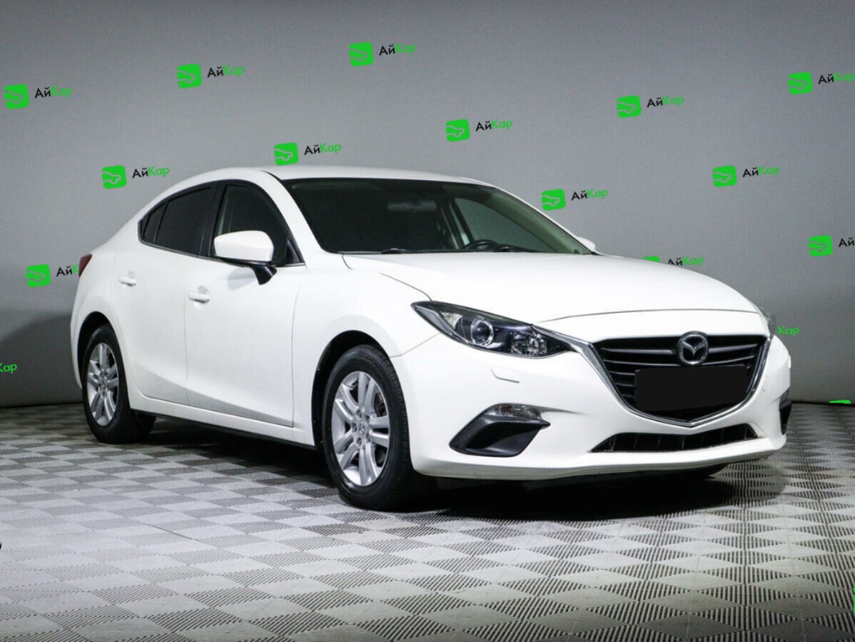 Mazda 3 с пробегом — 2014 год. Фото: #2