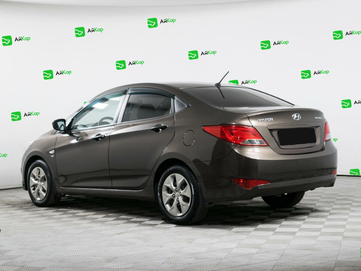Hyundai Solaris с пробегом — 2014 год. Фото: #6