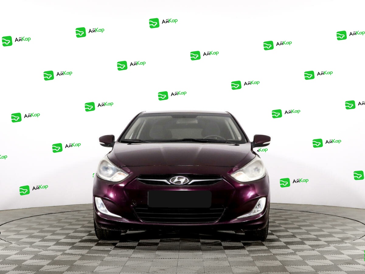 Hyundai Solaris с пробегом — 2013 год. Фото: #1