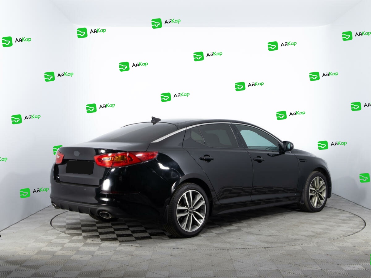 Kia Optima с пробегом — 2014 год. Фото: #4