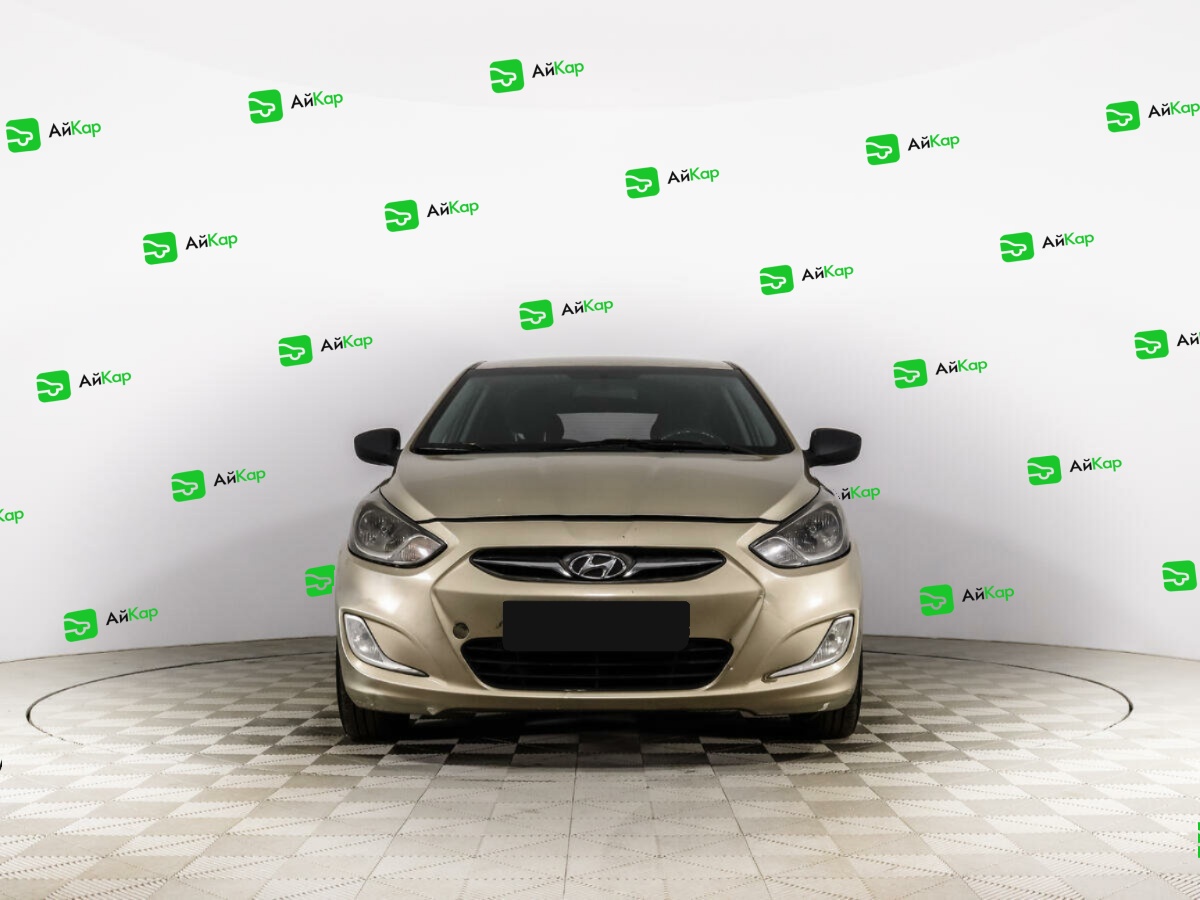 Hyundai Solaris с пробегом — 2013 год. Фото: #1