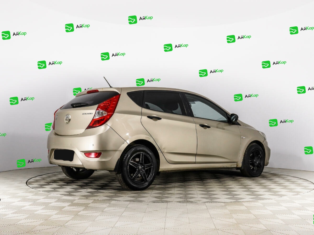 Hyundai Solaris с пробегом — 2013 год. Фото: #4