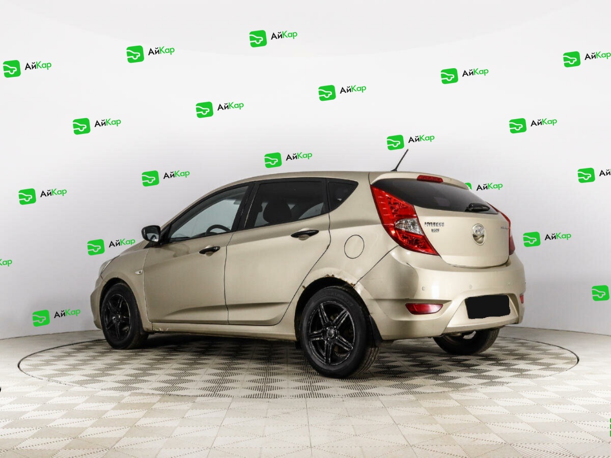 Hyundai Solaris с пробегом — 2013 год. Фото: #6