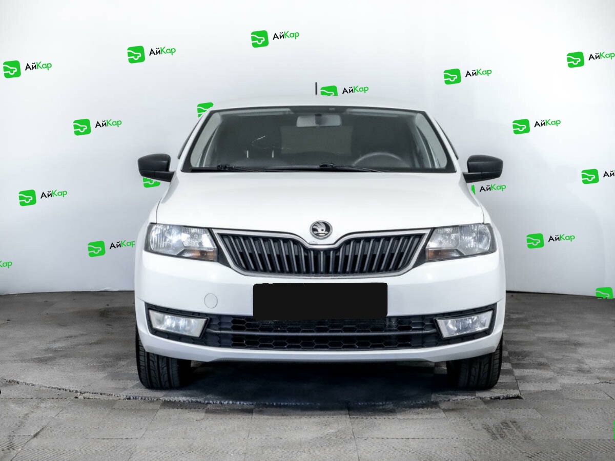 Skoda Rapid с пробегом — 2014 год. Фото: #1