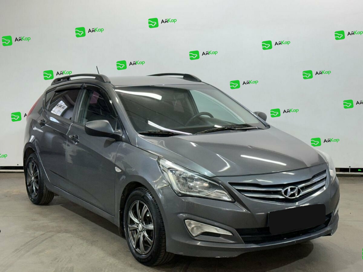 Hyundai Solaris с пробегом — 2015 год. Фото: #2