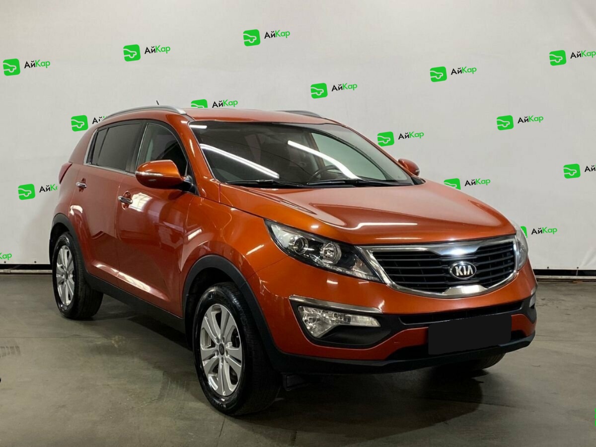 Kia Sportage с пробегом — 2013 год. Фото: #2