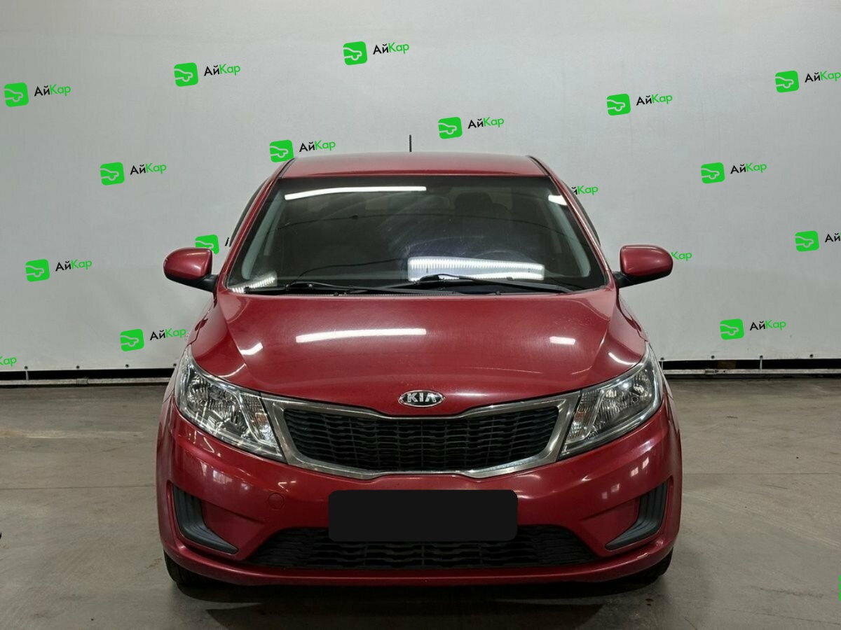 Kia Rio с пробегом — 2013 год. Фото: #1