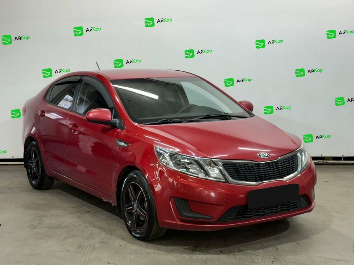 Kia Rio с пробегом — 2013 год. Фото: #2