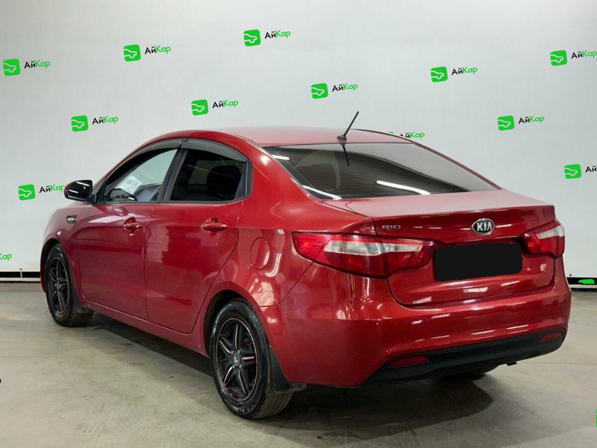 Kia Rio с пробегом — 2013 год. Фото: #6