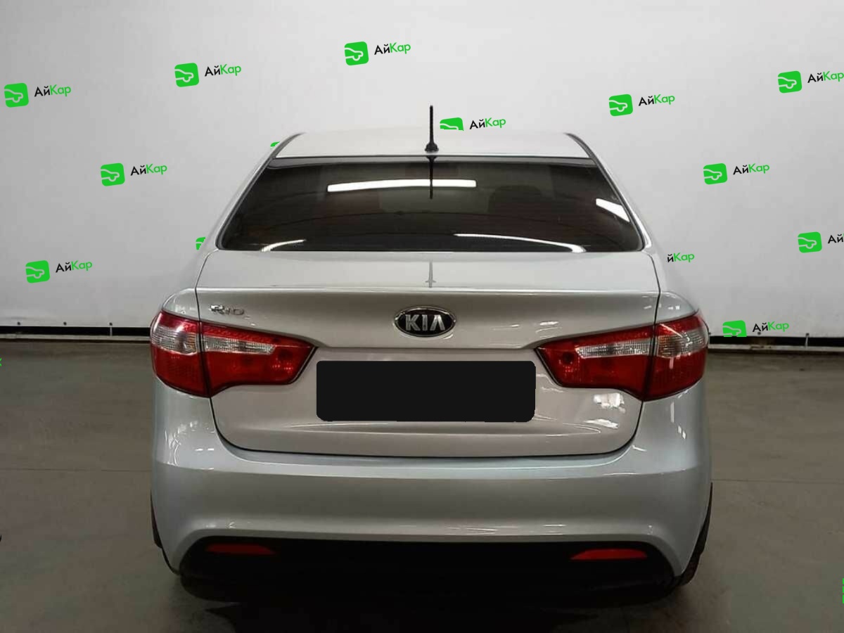 Kia Rio с пробегом — 2013 год. Фото: #5