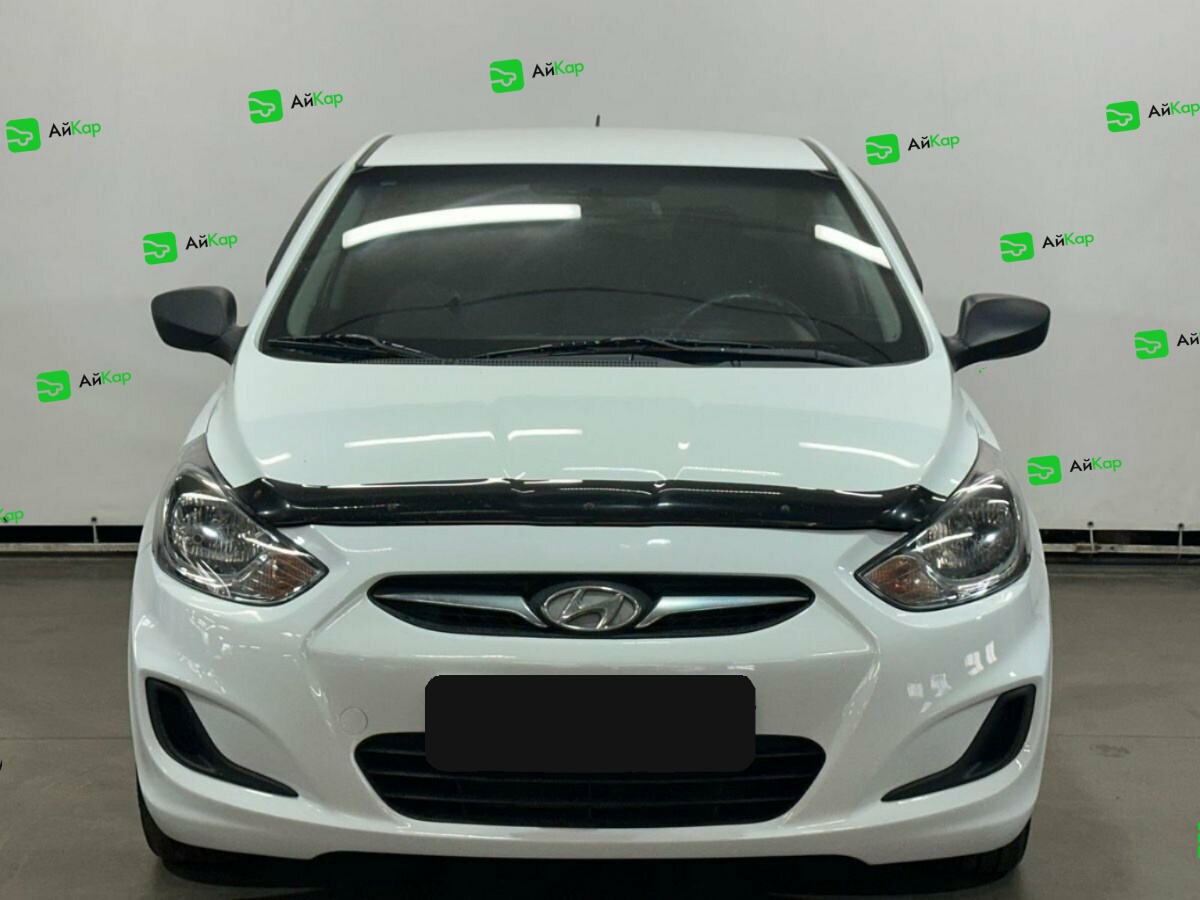Hyundai Solaris с пробегом — 2014 год. Фото: #1