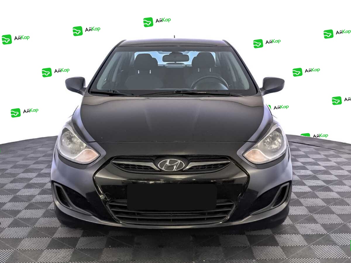 Hyundai Solaris с пробегом — 2013 год. Фото: #1