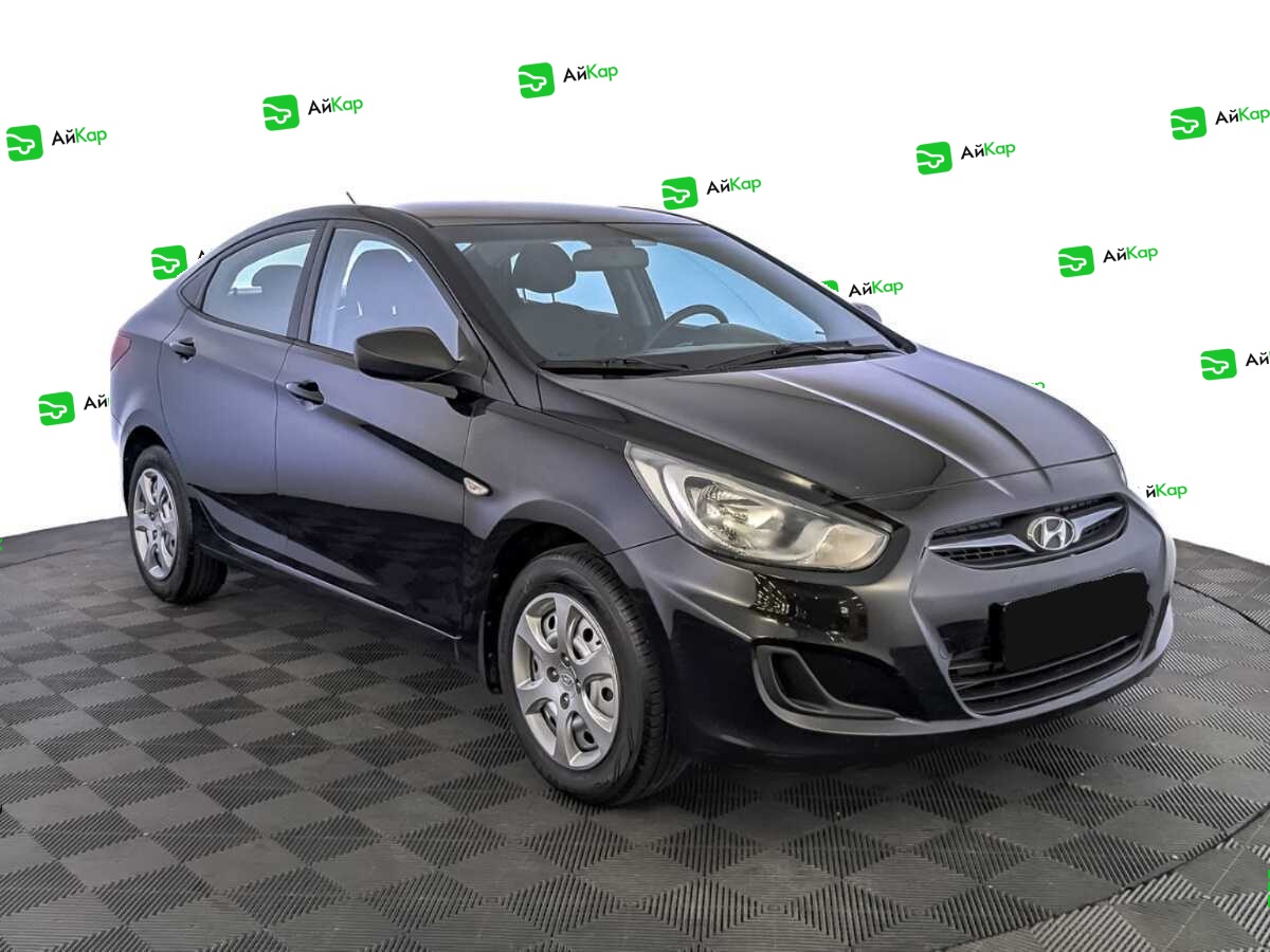 Hyundai Solaris с пробегом — 2013 год. Фото: #2
