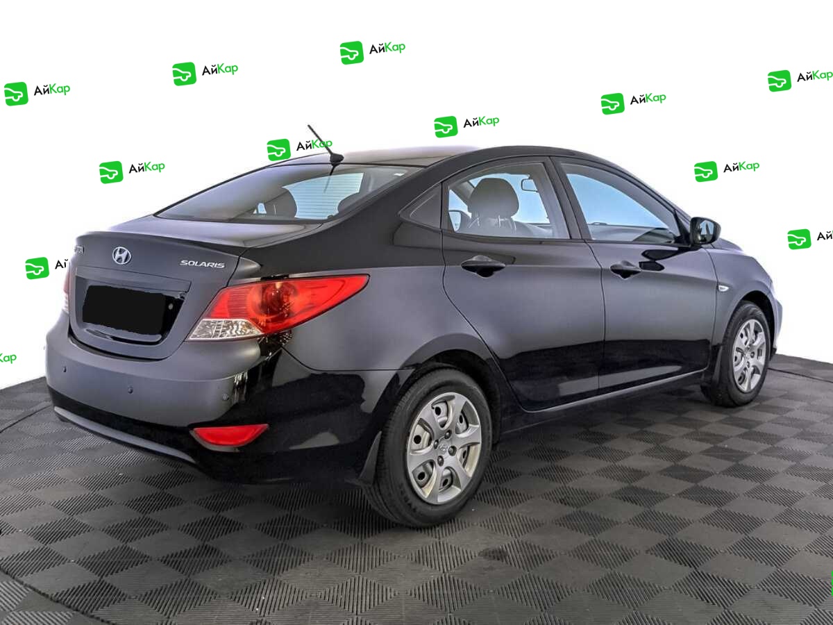 Hyundai Solaris с пробегом — 2013 год. Фото: #4