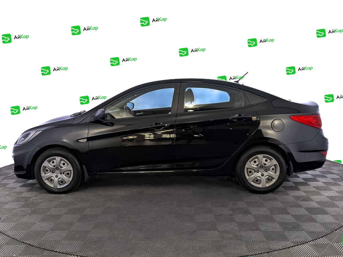 Hyundai Solaris с пробегом — 2013 год. Фото: #7