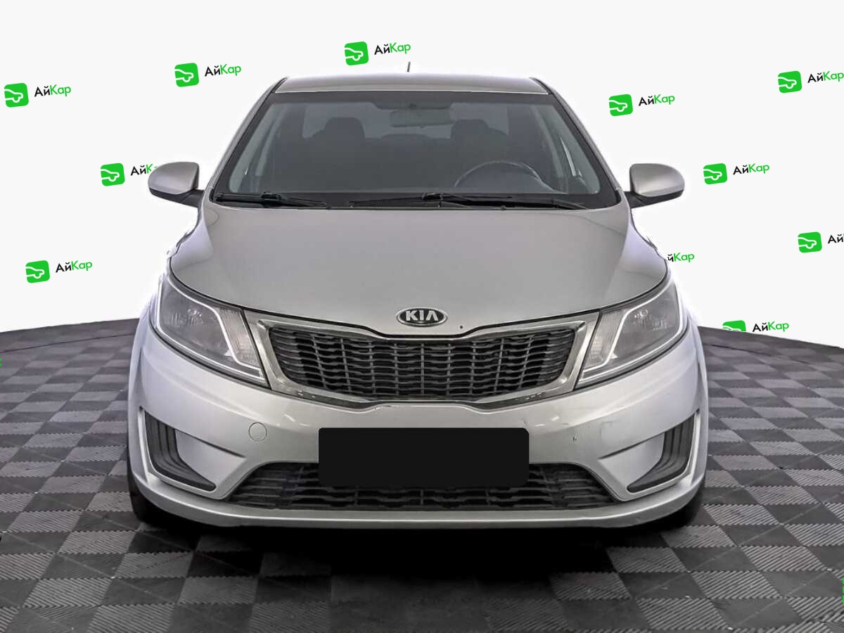 Kia Rio с пробегом — 2014 год. Фото: #1