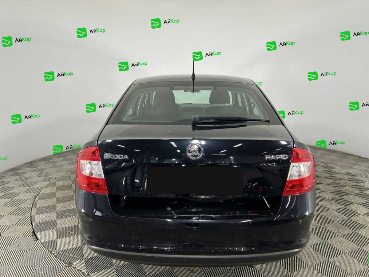 Skoda Rapid с пробегом — 2014 год. Фото: #2