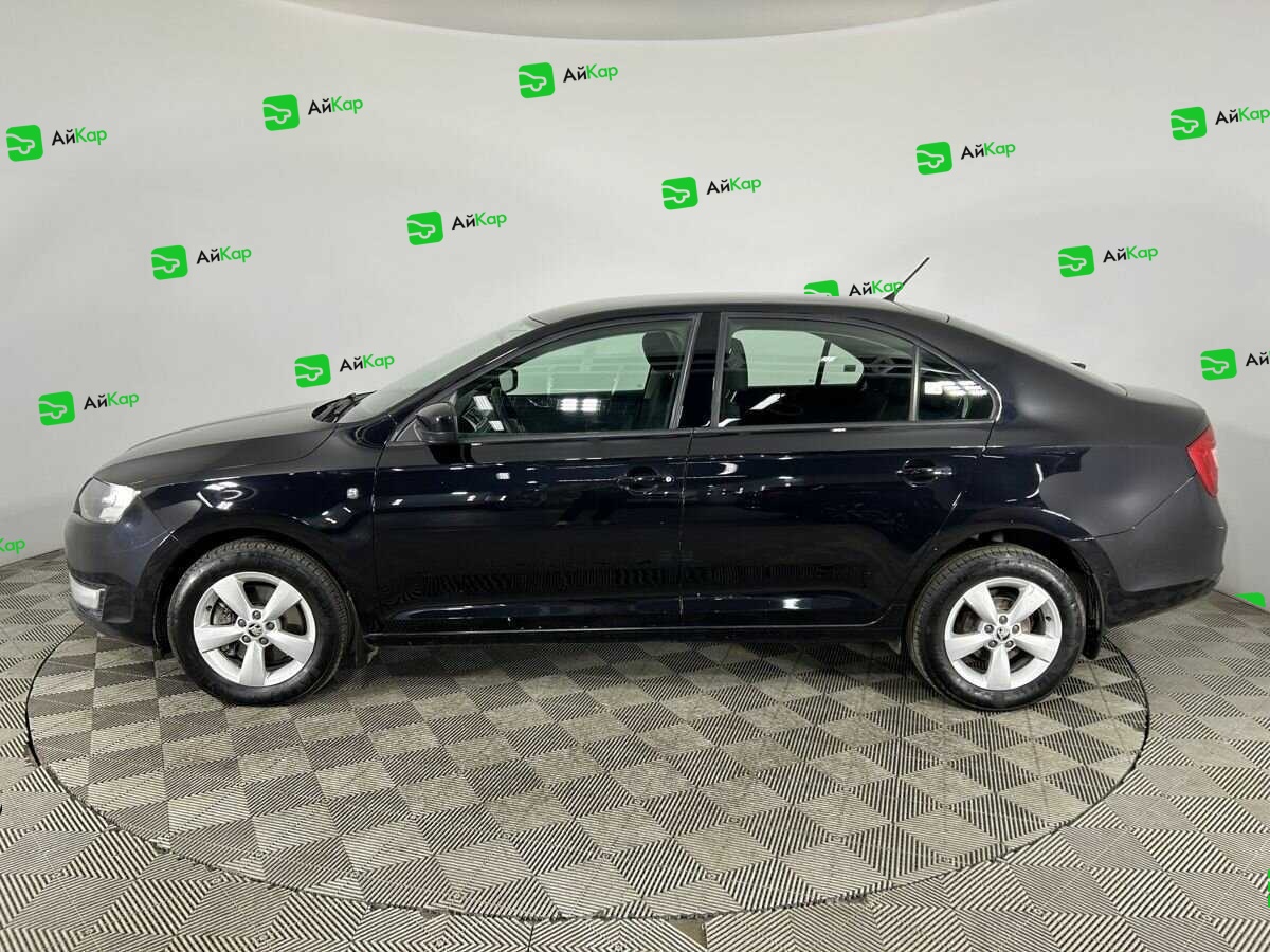 Skoda Rapid с пробегом — 2014 год. Фото: #4