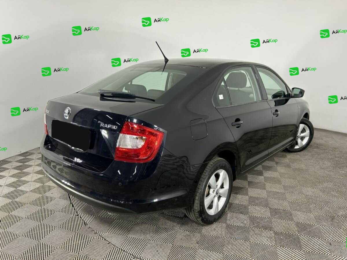 Skoda Rapid с пробегом — 2014 год. Фото: #5
