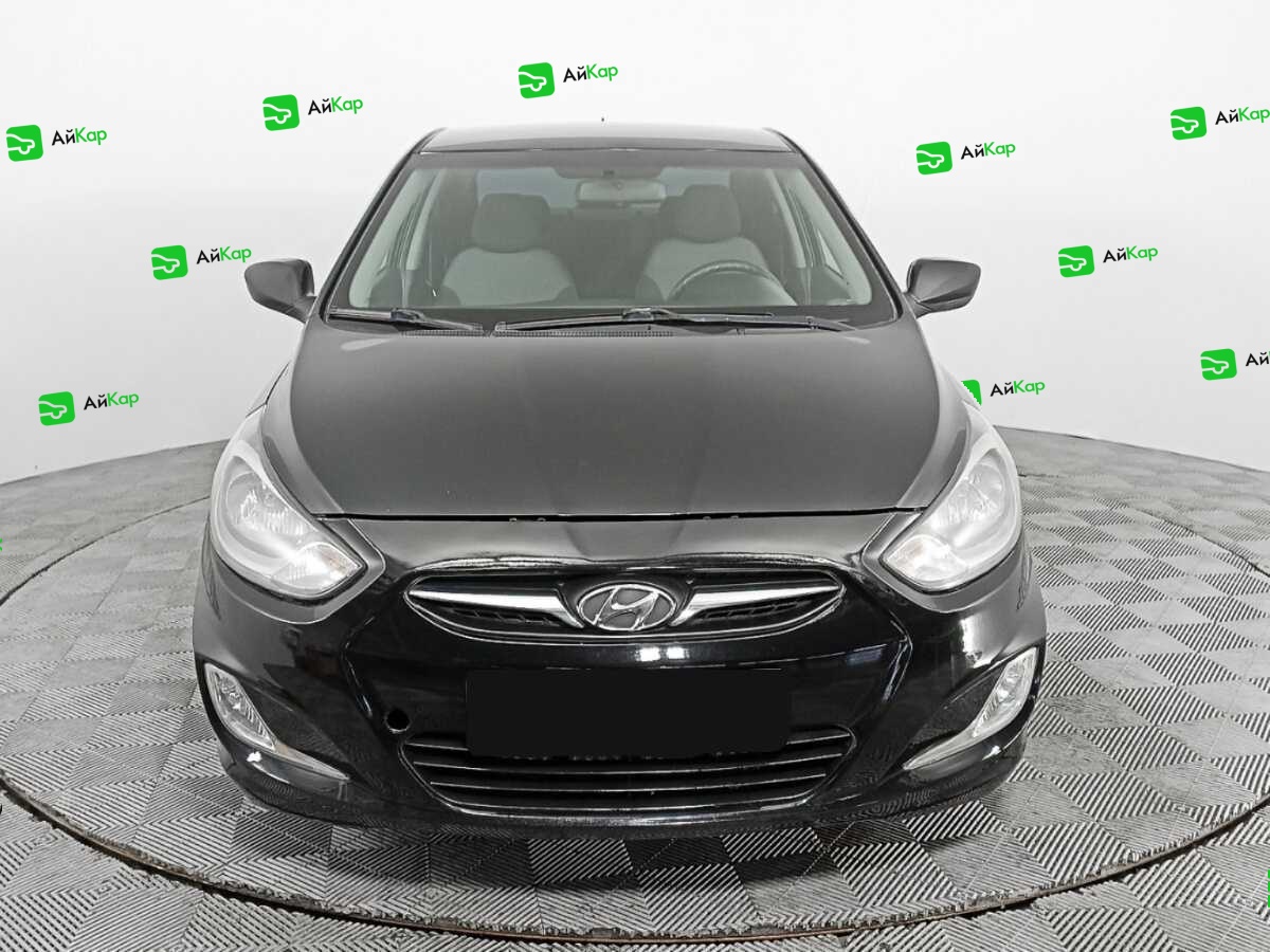 Hyundai Solaris с пробегом — 2013 год. Фото: #1