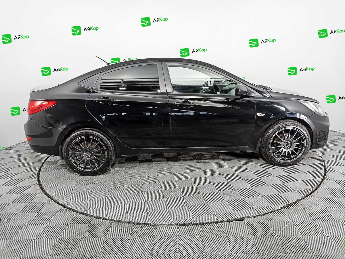 Hyundai Solaris с пробегом — 2013 год. Фото: #3