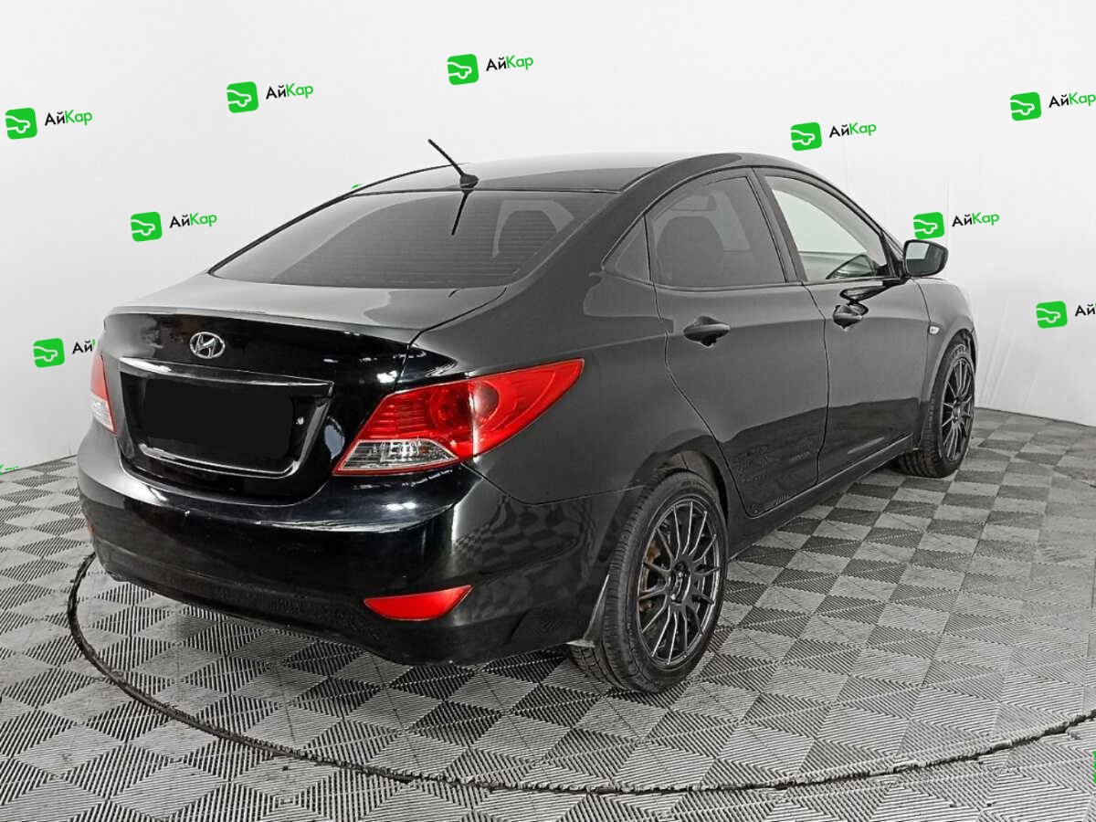 Hyundai Solaris с пробегом — 2013 год. Фото: #4