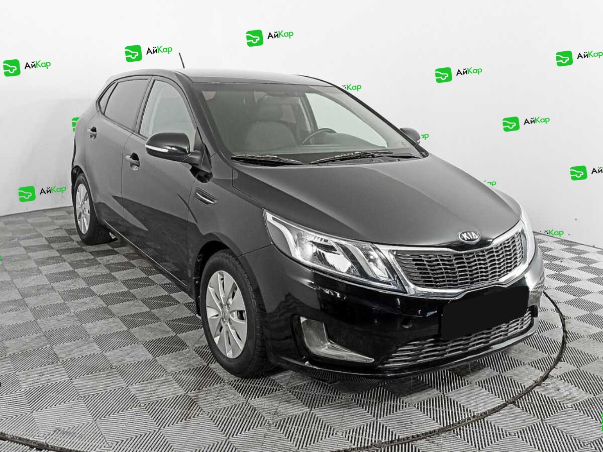 Kia Rio с пробегом — 2015 год. Фото: #2