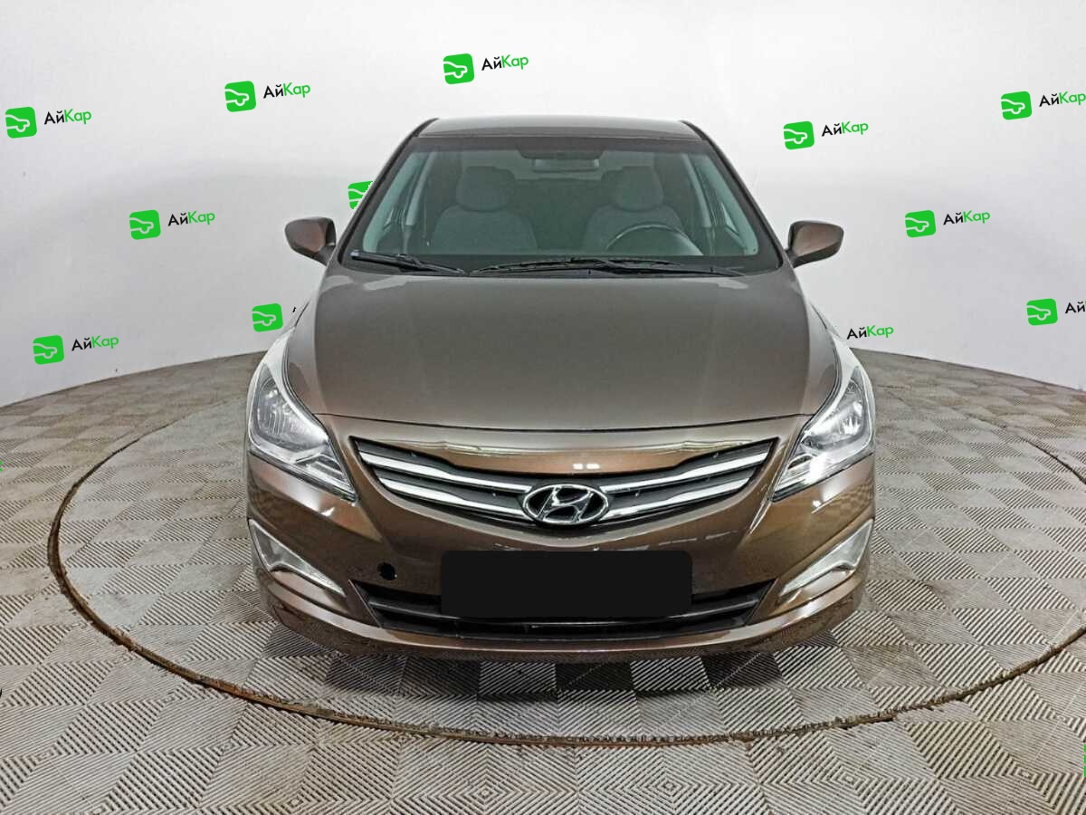 Hyundai Solaris с пробегом — 2015 год. Фото: #1