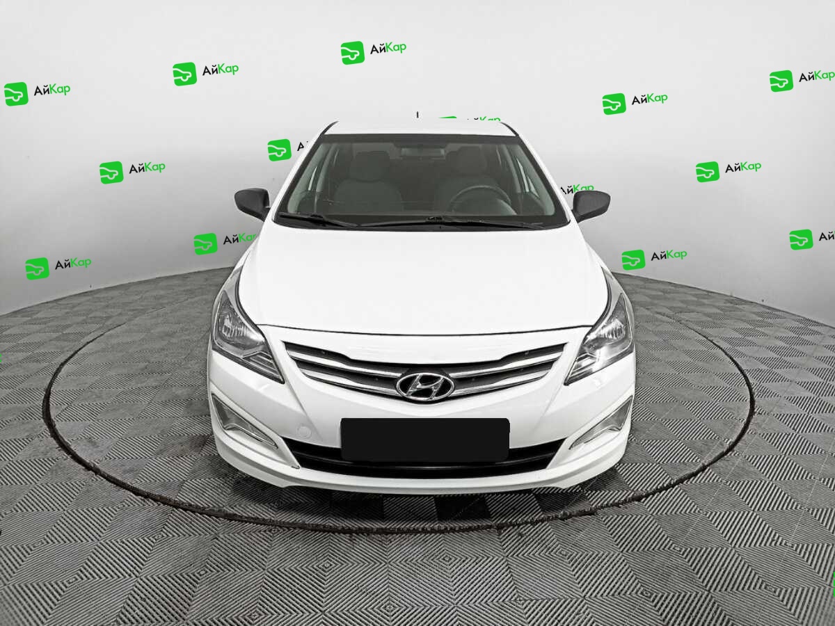 Hyundai Solaris с пробегом — 2015 год. Фото: #1