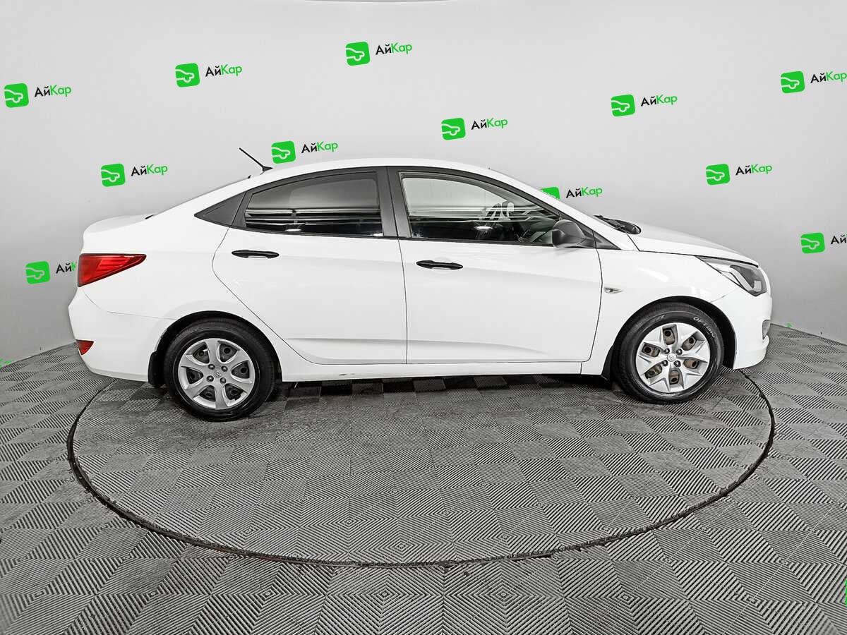 Hyundai Solaris с пробегом — 2015 год. Фото: #3