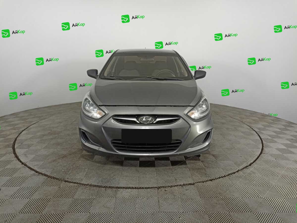 Hyundai Solaris с пробегом — 2013 год. Фото: #1