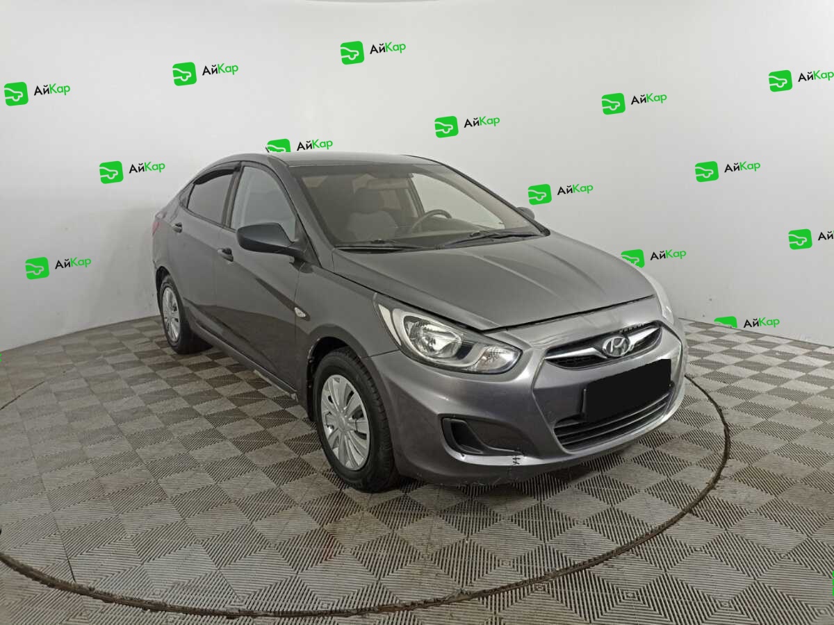 Hyundai Solaris с пробегом — 2013 год. Фото: #2