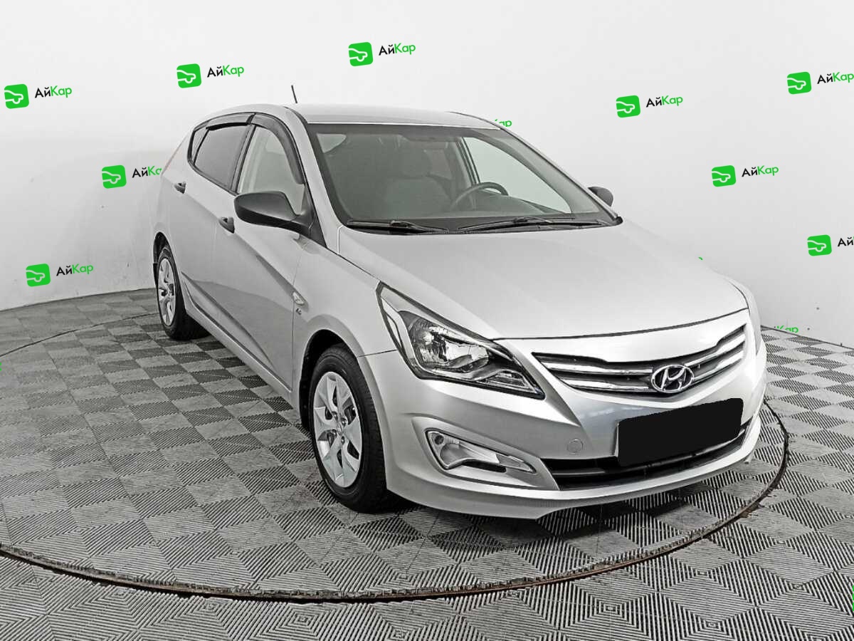 Hyundai Solaris с пробегом — 2015 год. Фото: #2