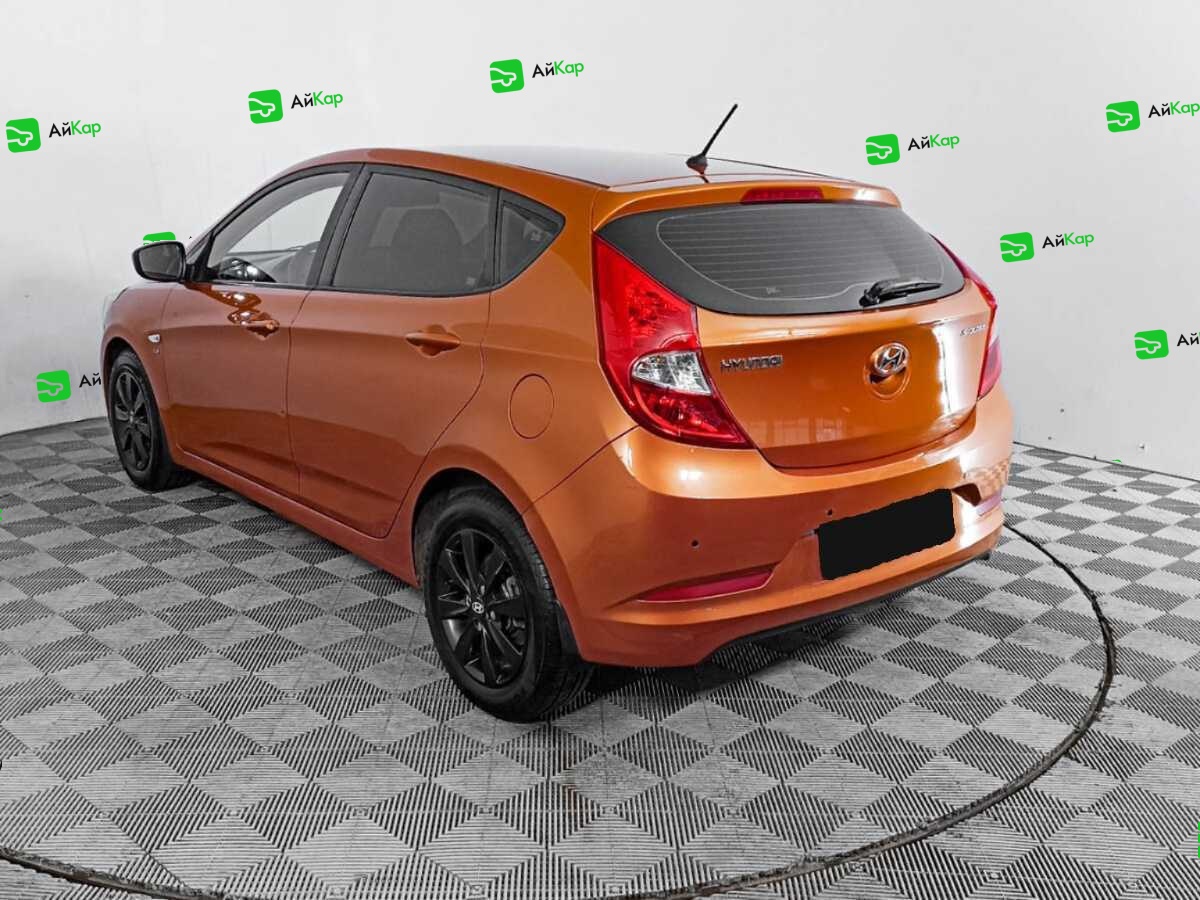 Hyundai Solaris с пробегом — 2014 год. Фото: #6