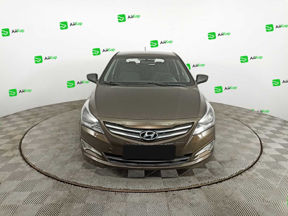 Hyundai Solaris с пробегом — 2014 год. Фото: #1