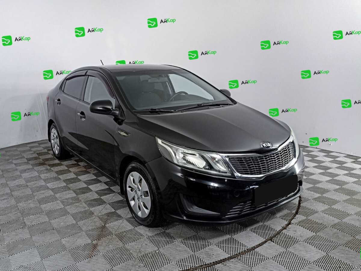 Kia Rio с пробегом — 2014 год. Фото: #2
