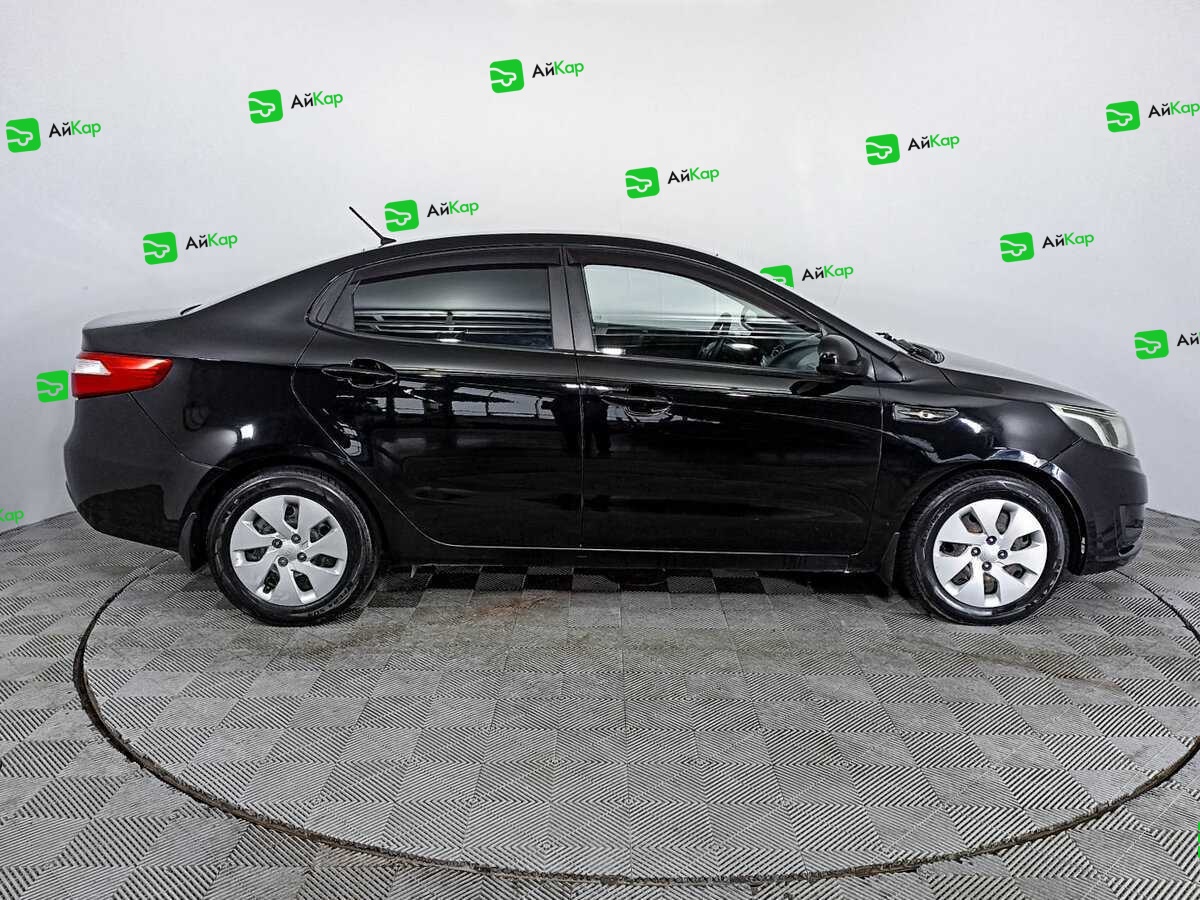 Kia Rio с пробегом — 2014 год. Фото: #3