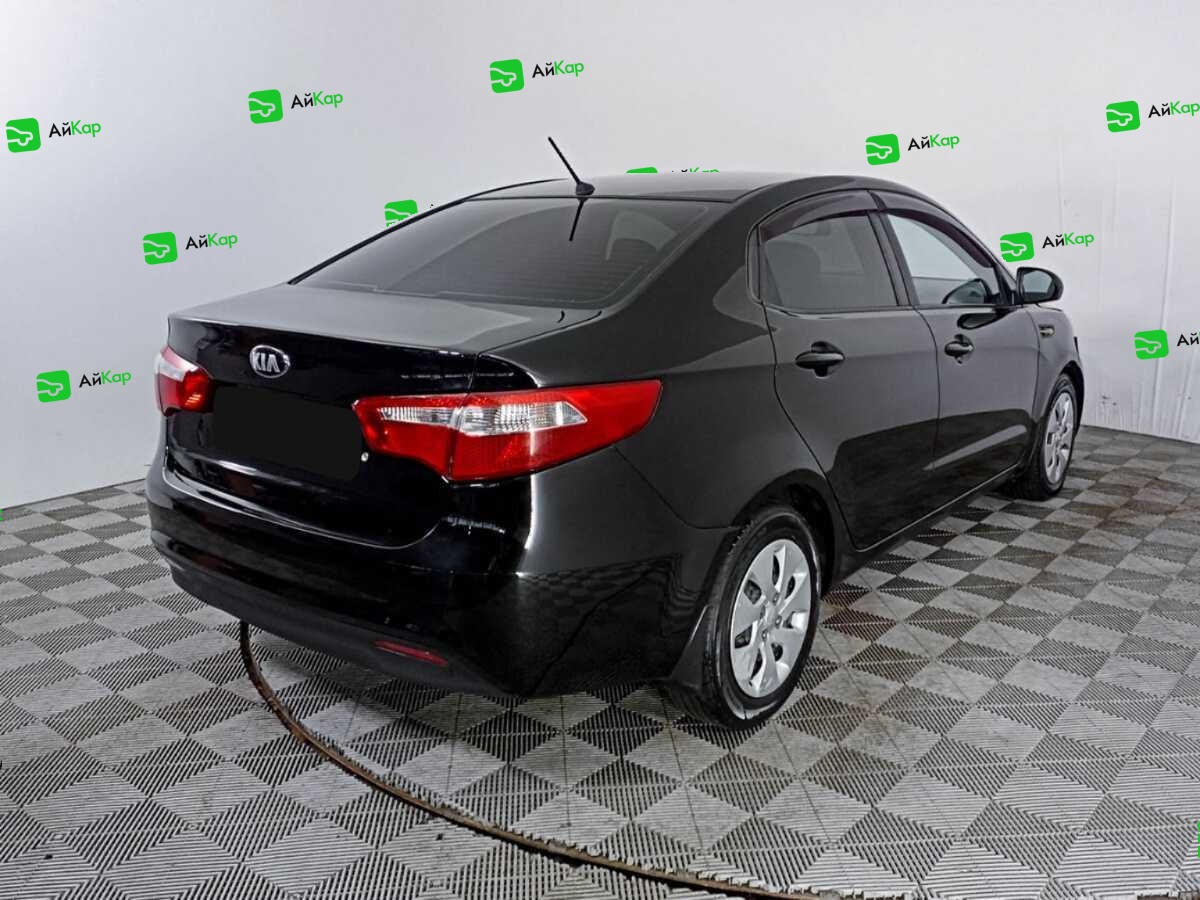 Kia Rio с пробегом — 2014 год. Фото: #4