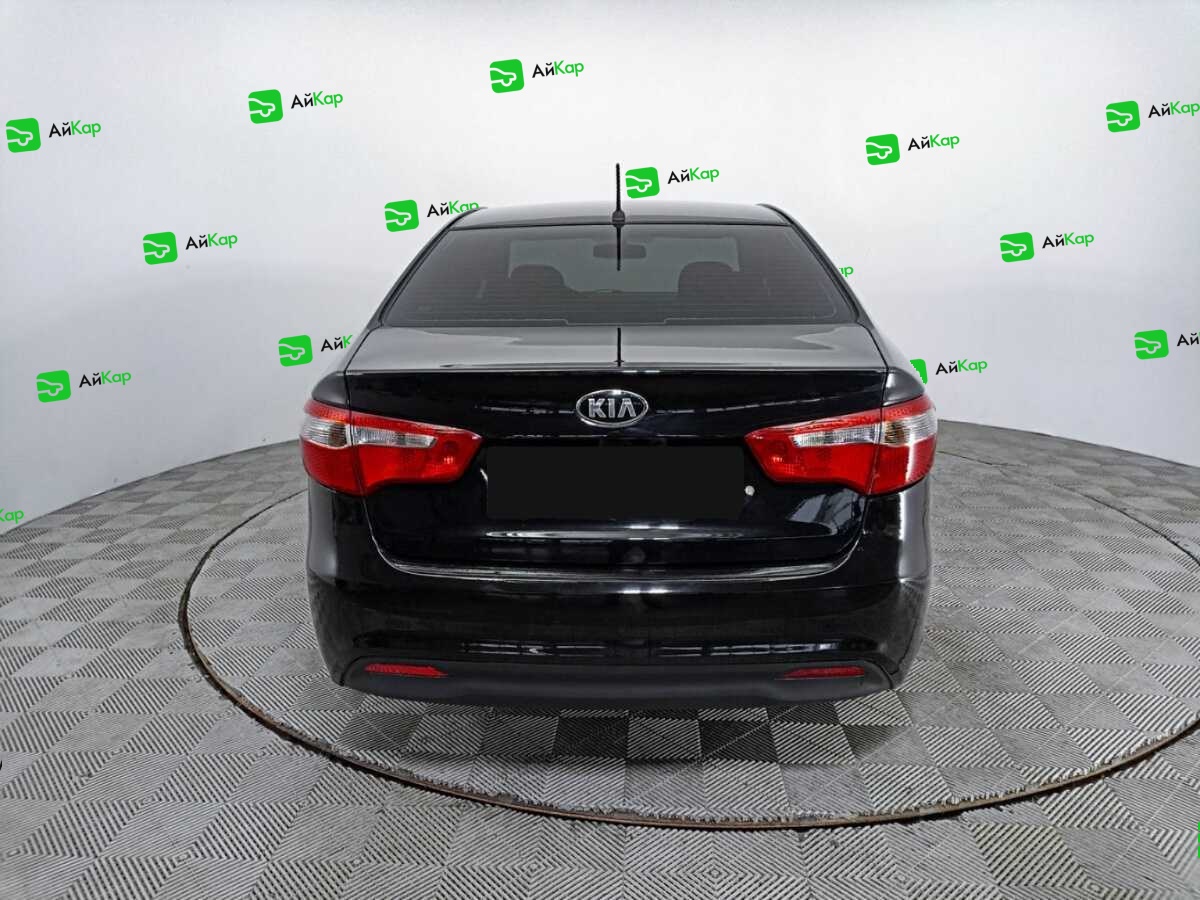 Kia Rio с пробегом — 2014 год. Фото: #5