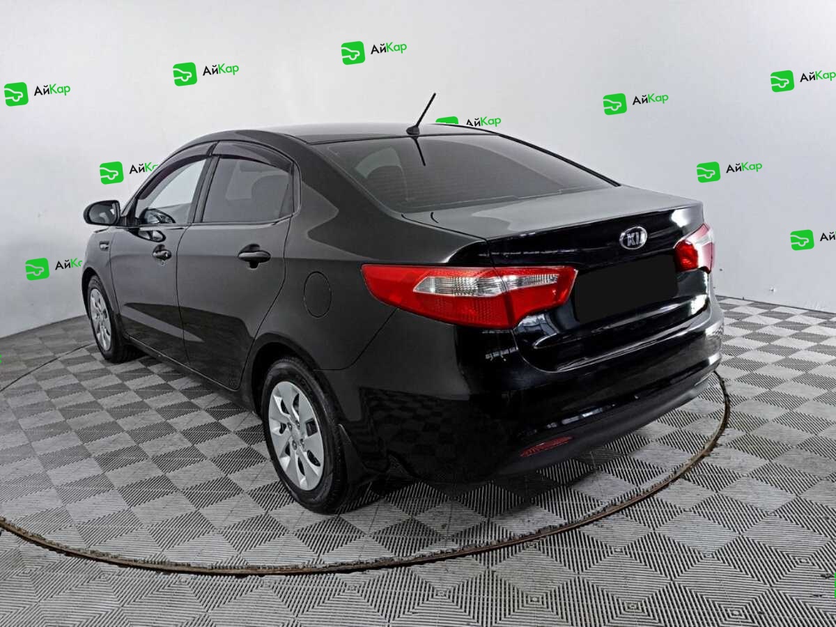Kia Rio с пробегом — 2014 год. Фото: #6
