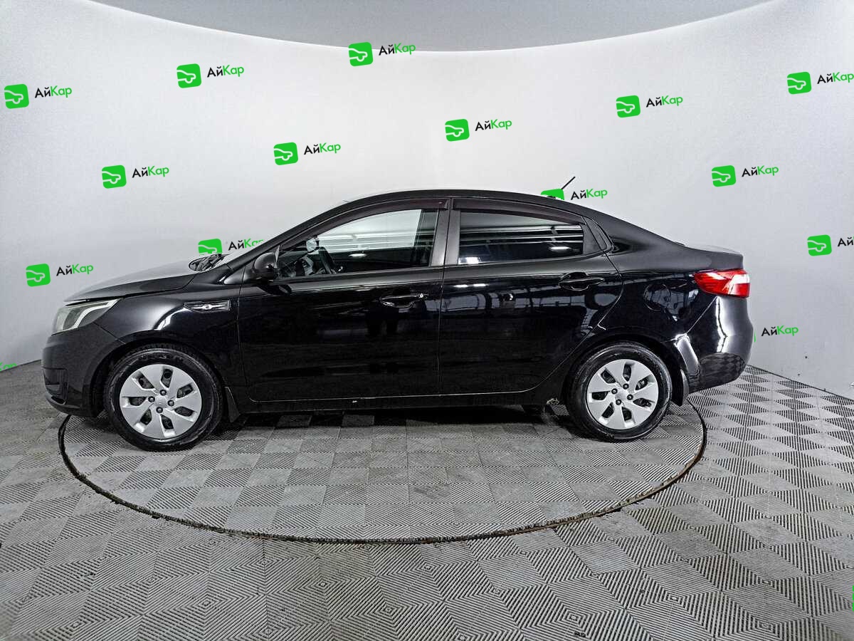 Kia Rio с пробегом — 2014 год. Фото: #7