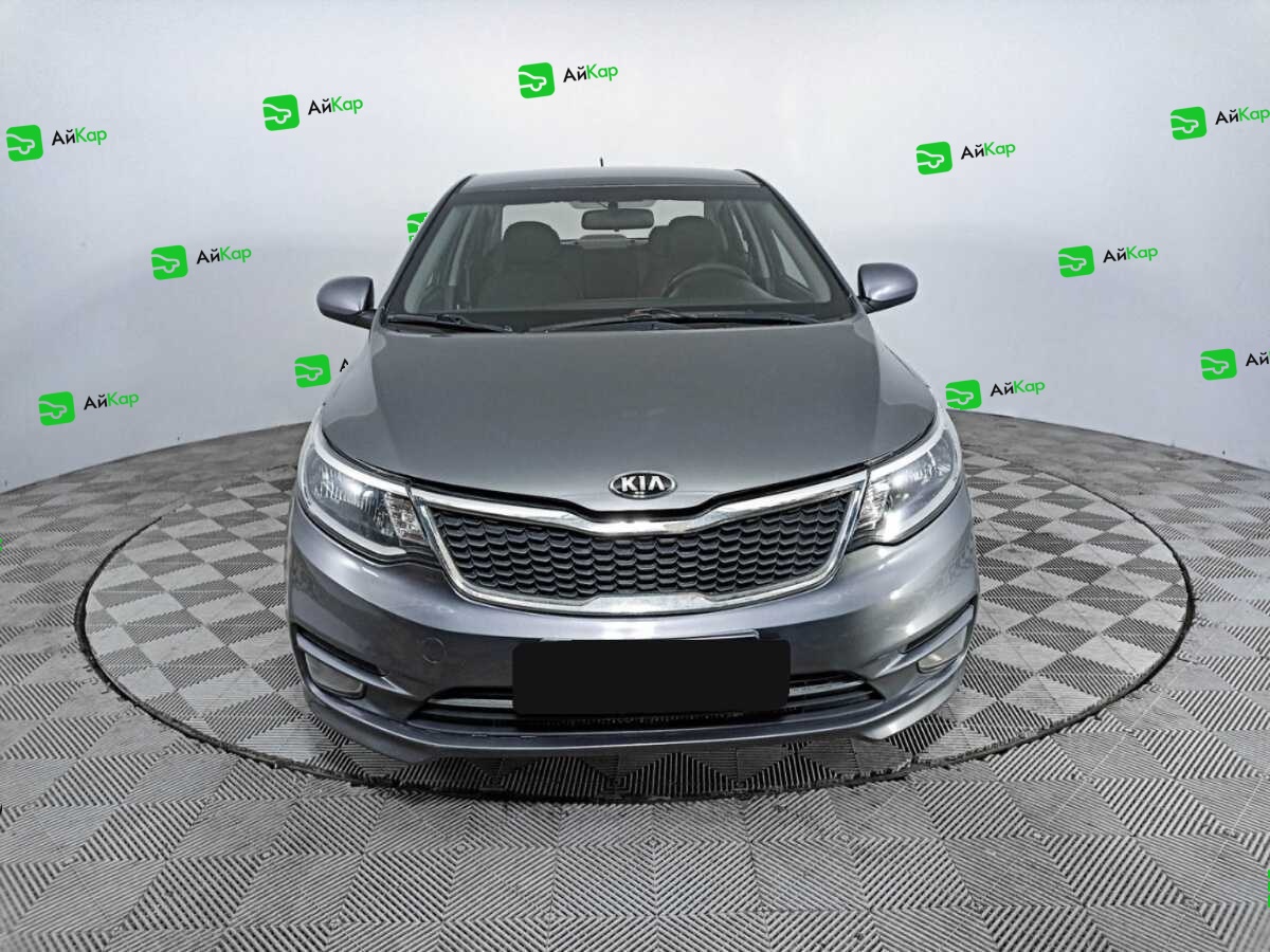 Kia Rio с пробегом — 2015 год. Фото: #1