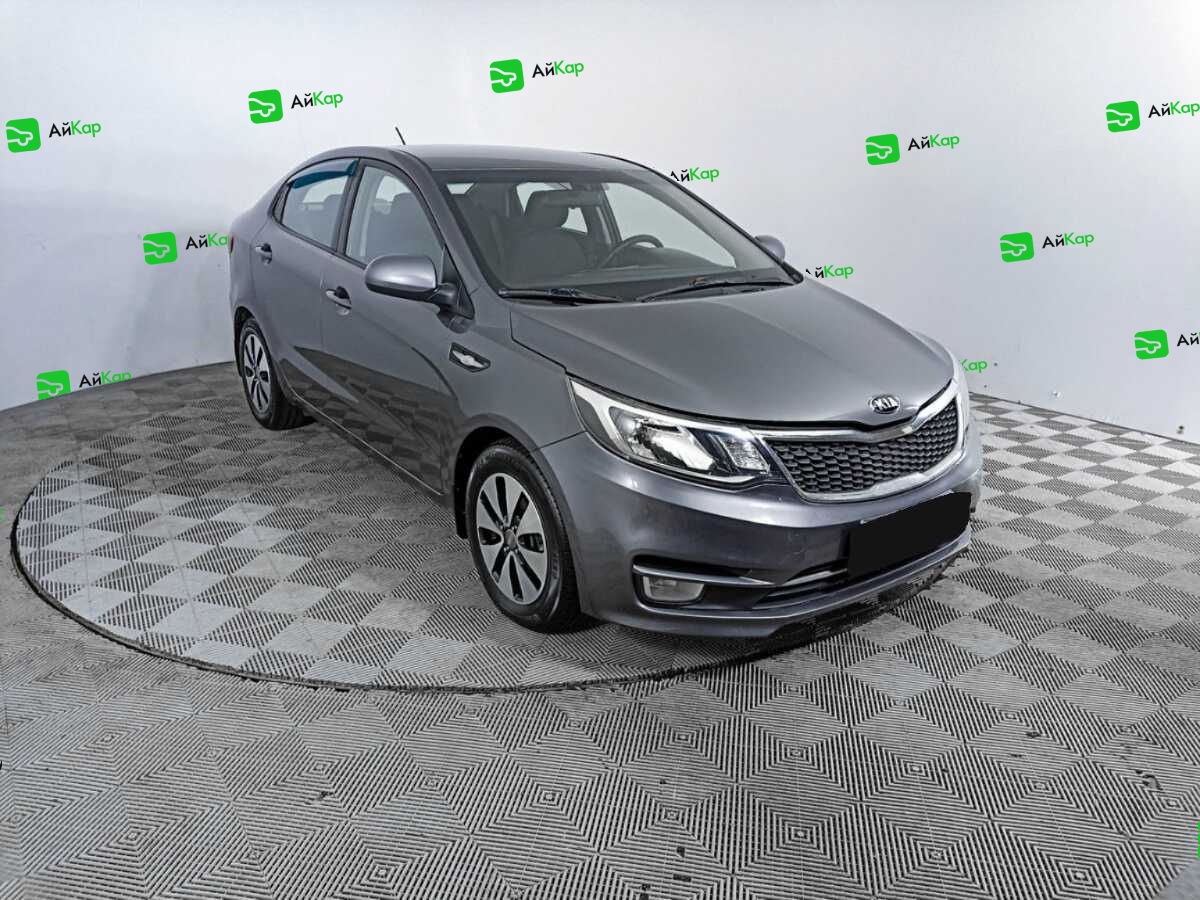 Kia Rio с пробегом — 2015 год. Фото: #2
