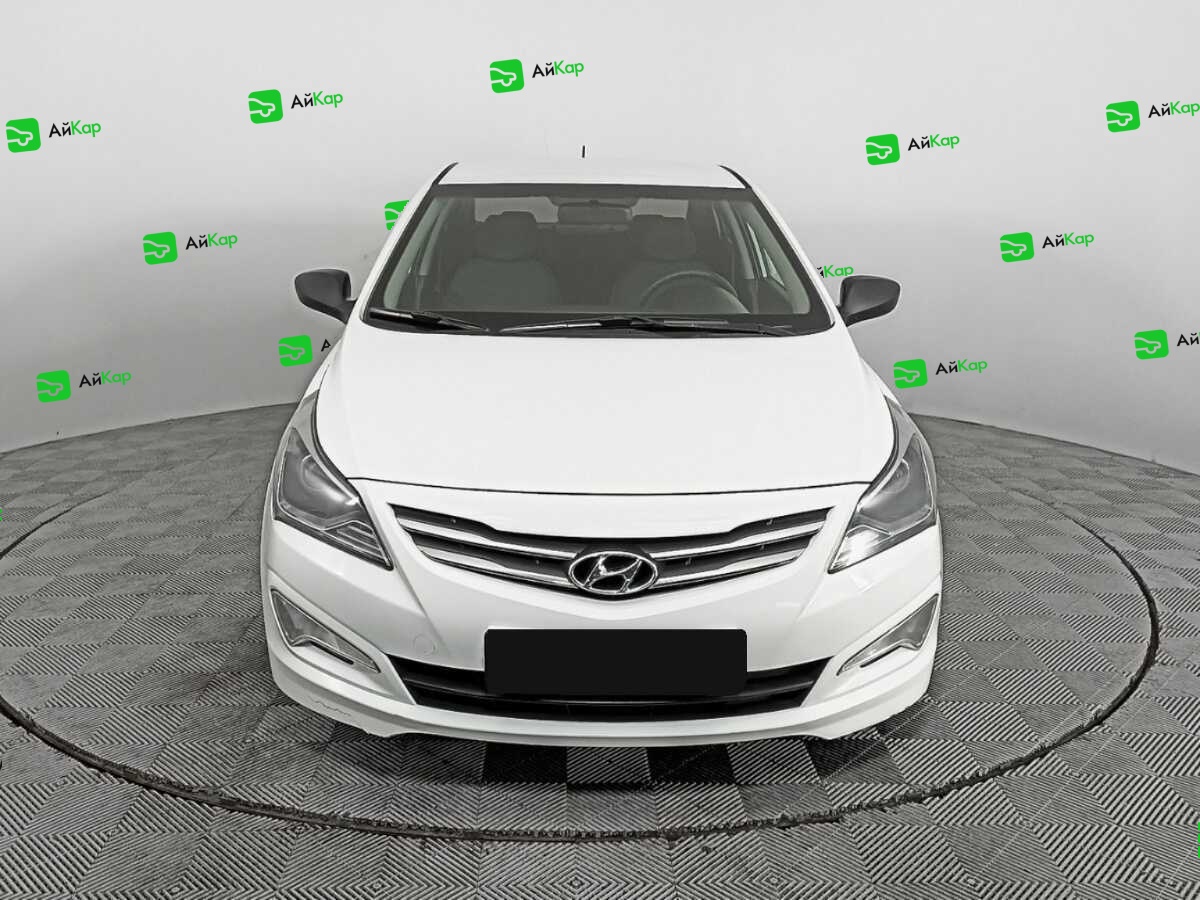 Hyundai Solaris с пробегом — 2015 год. Фото: #1